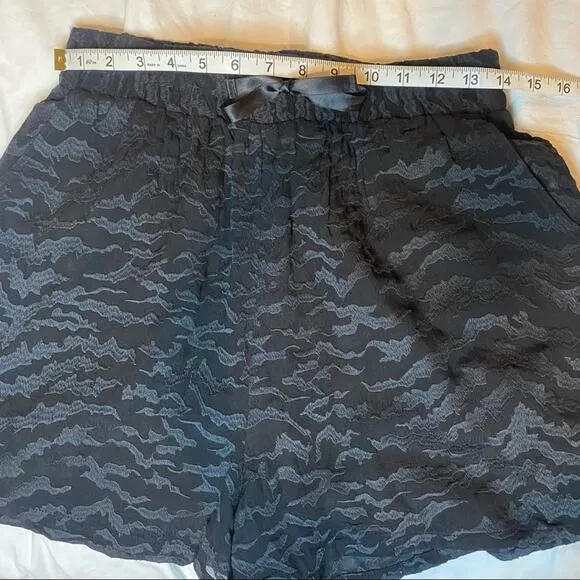 Good American Sheer Zebra Running short Sz 3/L