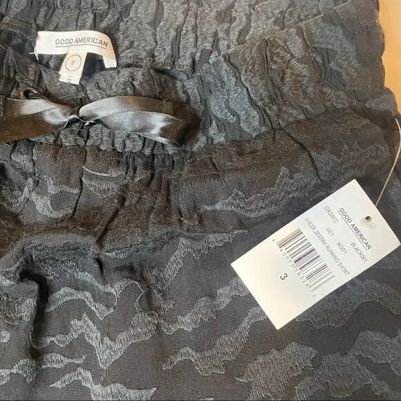 Good American Sheer Zebra Running short Sz 3/L